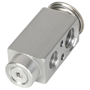 AGCO | Expansion Valve - Acw6040220, an aluminum pneumatic valve block with multiple threaded ports and a circular actuator on top, is used in fluid control systems.