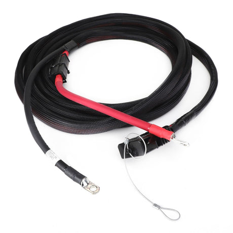 The AGCO Power Supply Wire - Acp0146410 is a coiled black and red battery cable with eyelet terminals and a durable protective sleeve, perfect for reliable connections.