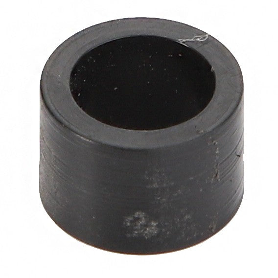 A close-up of the AGCO Spacer - Acw1756700, a cylindrical black rubber bushing with a hollow center. No current product description information is available for this item.