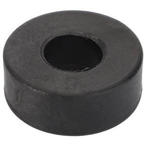 The AGCO Roller - La320927050 by AGCO is a black, round rubber grommet with a central hole, designed for durability and versatility.