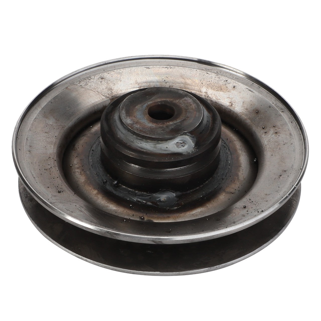 An AGCO | PULLEY - D28485390, a weathered, metallic pulley with a central hole and surrounding grooves, showing clear signs of wear and corrosion.