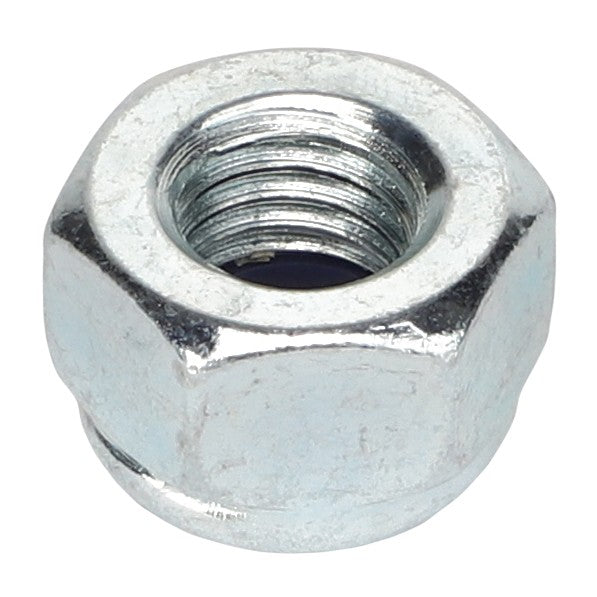 A close-up image of the AGCO LOCKNUT - AL5011554, a metal hex nut featuring a threaded interior and a plain exterior surface, typically used for securing bolts.