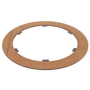 The AGCO Disc - 3790270M1 is a round, flat, metallic gasket with a brownish surface, featuring a textured pattern and small tabs around the inner edge, specifically designed for Massey Ferguson models.