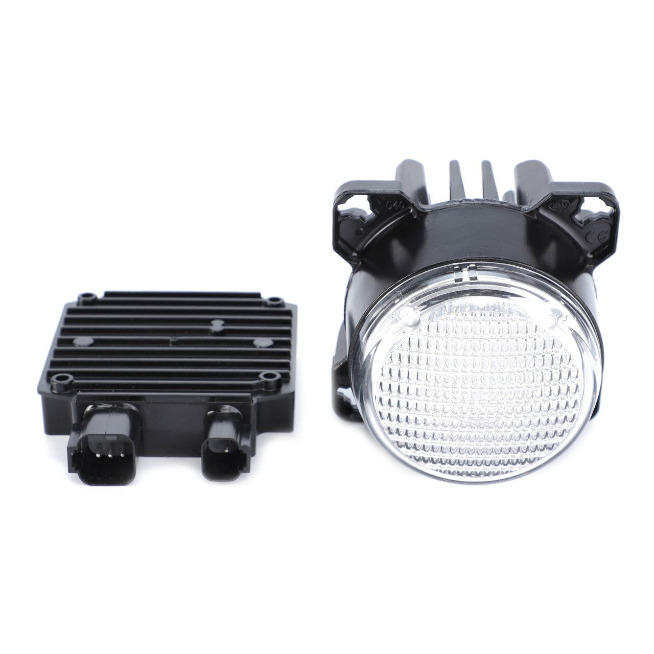 A round LED car headlight, specifically the AGCO | Work Light, Front, Led - G842900110070, and a rectangular electronic control module, reminiscent of Fendt models, are placed side by side on a white background.