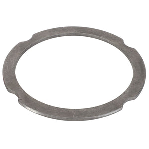 The AGCO Compensating Ring - F007200210320, a round, flat metal ring from AGCO, features four evenly spaced notches along its outer edge, seamlessly blending form and function.