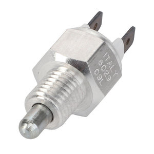 Close-up of the AGCO SWITCH - D45050099, an automotive sensor made of metal and plastic, featuring a threaded body and two electrical connectors at the top. Markings on the side indicate it is made in Italy. Currently, no further product description information is available.