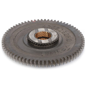 The AGCO Pinion - 4310827M91 is a metallic gear with a circular shape, featuring multiple teeth around its edge and a central hole lined with bronze, essential for enhancing machinery performance.