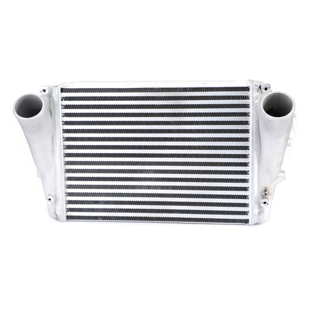 A front view of a metallic AGCO | Intercooler, Air To Air Type - Acw043584A car intercooler with two large tubular inlets on either side, designed to enhance engine efficiency by optimizing compressed air temperature.