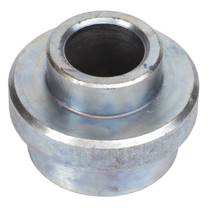 The AGCO Bush - Acw9076190 is a metallic cylindrical bushing featuring a wide flange near the top and a hollow central section. Further product description information is currently unavailable.