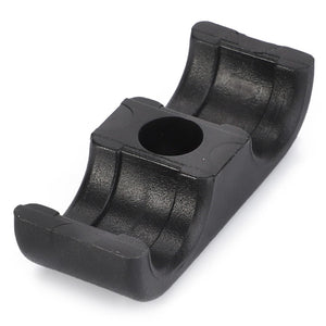 The AGCO | CLAMP - AL735215 is a meticulously designed black plastic clamp featuring a central circular hole and curved ends, perfect for securing cylindrical objects with precision.