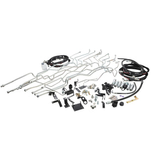 Introducing the AGCO Kit, Pipe - Acw0176220: A meticulously curated collection of automotive parts including metal pipes, brackets, hoses, and fittings from the renowned brand AGCO, all elegantly arranged on a pristine white background.