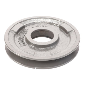 An AGCO Belt Tensioner - La300033832, a round, gray, metal industrial pulley with a central hole and detailed with indents and raised markings on its surface, isolated on a white background.