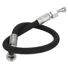 The AGCO Hydraulic Hose - Acw3524220, a black rubber hose branded by AGCO, features metallic fittings on both ends. One side has a larger hexagonal nut, while the other end has a smaller threaded connector. The hose is coiled in a loose loop.