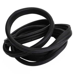 A coiled seal, AGCO | Seal - 4382172M2, in black rubber against a white background, reminiscent of the sturdy components used in Fits Fendt machinery.