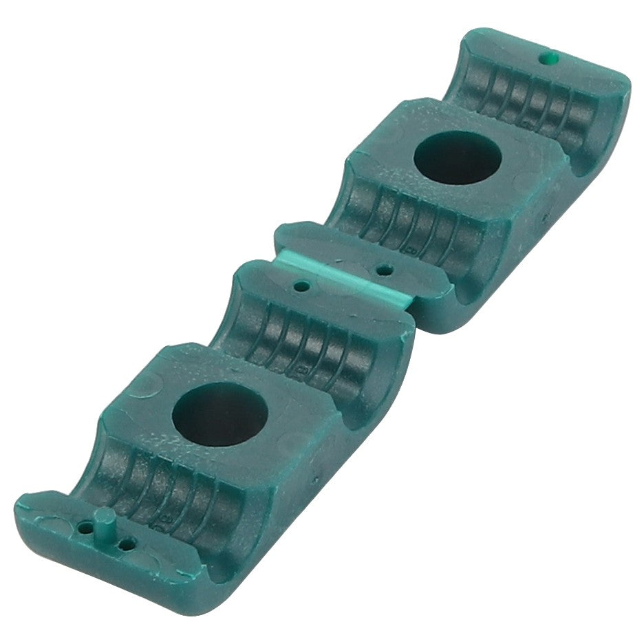 The AGCO | CLAMP - D26732813 is a green plastic clamp featuring two circular holes and a sleek, curved design, making it perfect for securing pipes or cables.