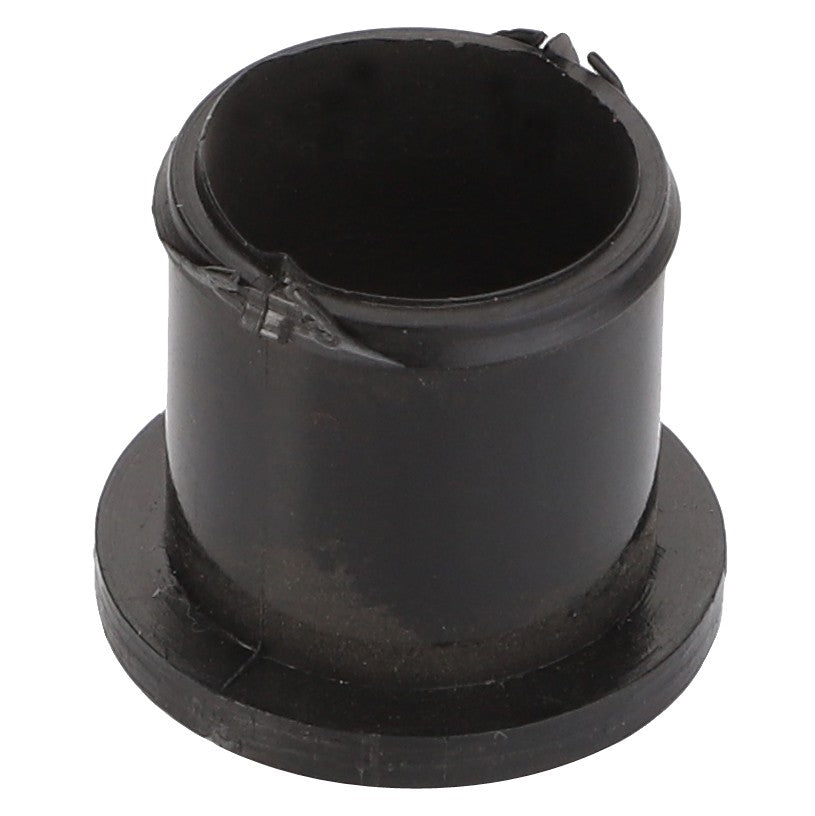 A black cylindrical rubber bushing with a flanged base, showing signs of wear and tear. Product: AGCO | BEARING BUSHING - V31027700, by AGCO. No additional product description information available at this time.