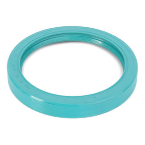 A circular, teal-colored AGCO rubber shaft seal with ridged edges is featured under the product name "AGCO | Shaft Seal - F184100220071," as no current product description is available.