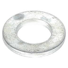 The AGCO FLAT WASHER - AL5013101 is a metallic flat washer featuring a circular shape and a precisely machined hole in the center.