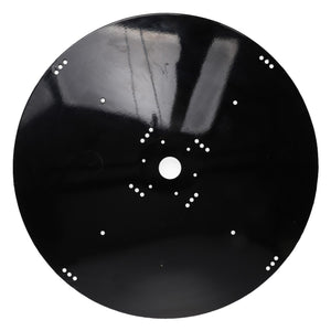 AGCO | DISTRIBUTION DISC, RIGHT HAND - AG059267 is a black, circular metal disk featuring a central hole and multiple smaller holes symmetrically distributed around its surface. No current product description information is available.