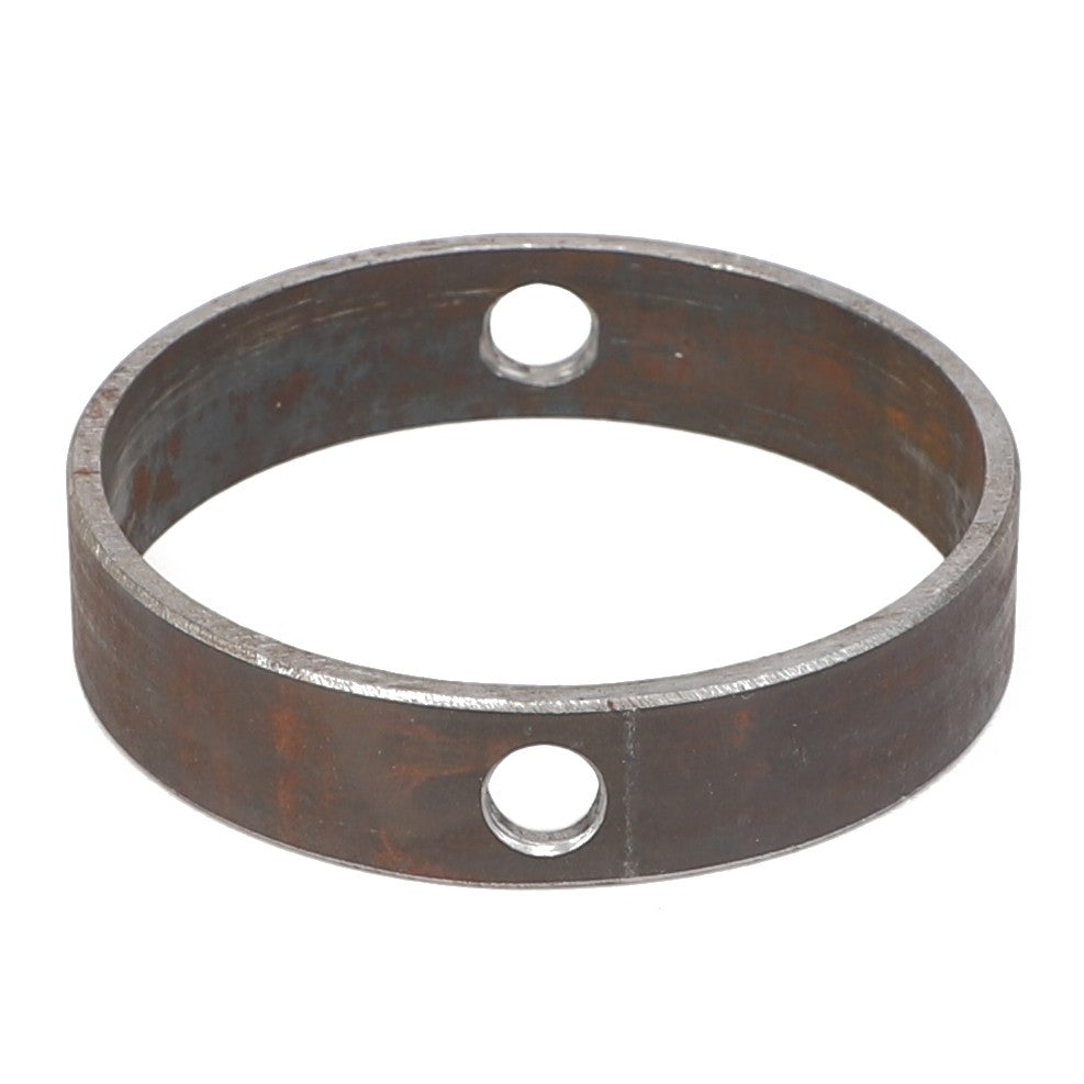 The AGCO Bearing Spacer - Acp0003130 is a round metal ring featuring two evenly spaced holes. No additional product description is available at this time.