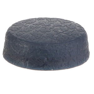 The AGCO | CAP - D45749800 by AGCO is a round, textured rubber foot pad designed to provide a non-slip base for objects such as furniture or electronics, ensuring stability and protection.