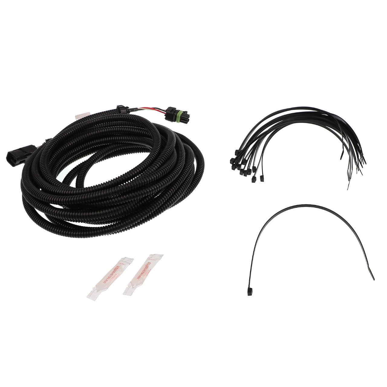 The AGCO | CABLE - AG428729, a coiled black wire harness featuring various connectors, comes with zip ties, a single black wire, and two small packets that likely contain lubricant or adhesive. Unfortunately, no further product description information is available at the moment.