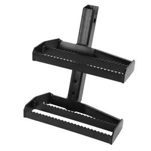 The AGCO Right Hand Step (4280372M93) by AGCO is a rugged black metal attachment featuring serrated edges, ensuring secure footing when using a vehicle tow hitch.