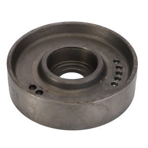 A circular, metallic automotive part with a central hole and multiple smaller holes around its inner edge is shown. Product Name: AGCO | Belt Tensioner - La320810050. Brand Name: AGCO.