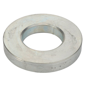 The AGCO | WASHER - D28150131 is a silver metallic washer with a central circular hole, utilized in various mechanical and structural applications. No current product description information is available.
