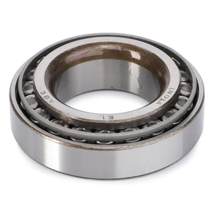 The AGCO Taper Roller Bearing - 1851800M91 is a metal bearing featuring an inner and outer race, visible rollers, and markings on the outer race. It is ideal for Massey Ferguson Models.