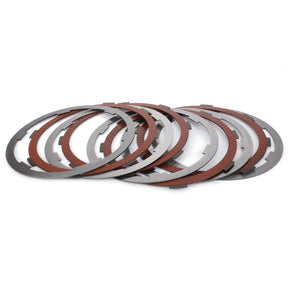 The AGCO | Clutch Plate Kit - 3761845M91 features a set of six circular wet clutch plates, each with metal and friction linings, arranged in a stack on a white background.