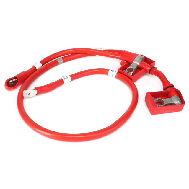 The AGCO Positive Battery Cable, branded under AGCO as model Acw1396130, is a red electrical cable with attached connectors that features a rectangular terminal block and ring terminals at each end.