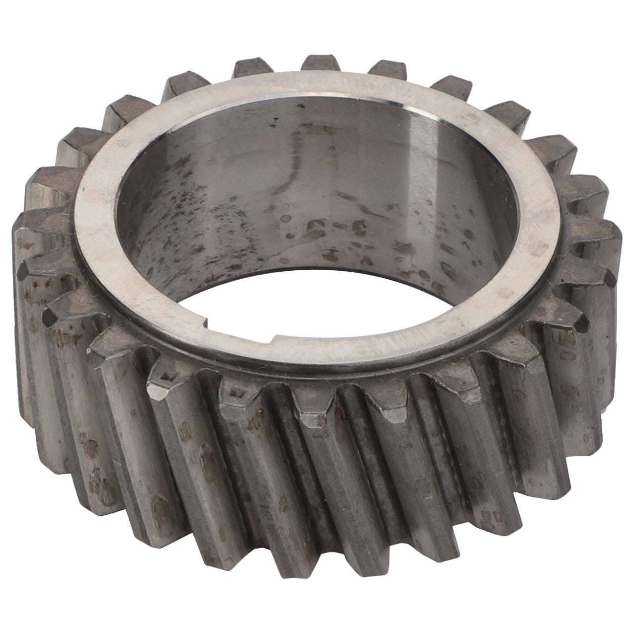 A close-up image of an AGCO | Helical Gear - V836122840 with visible teeth and a central hole. The gear has a worn, slightly tarnished surface, showcasing AGCO's renowned durability in their genuine parts.