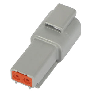 A close-up of the AGCO SOCKET TERMINAL - AG523363, a gray electrical connector with two visible orange ports on one end.