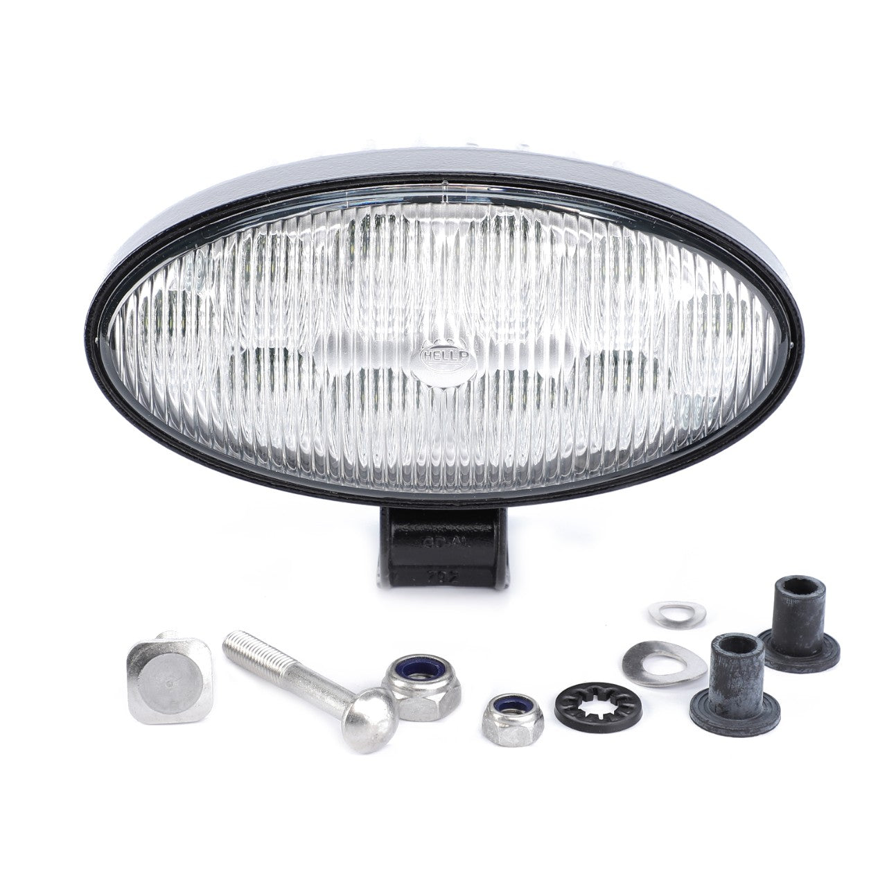 The AGCO Work Light, LED (ACW0607820) is an oval-shaped vehicle headlight from AGCO Parts that comes with mounting hardware, including bolts, nuts, washers, and rubber grommets arranged below it. Featuring a clear lens with a patterned reflector, these LED work lights ensure optimal visibility.