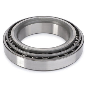 The AGCO Taper Roller Bearing - 3016138X91, a high-quality bearing from the AGCO brand, features an inner and outer ring along with cylindrical rollers arranged to efficiently handle both radial and thrust loads.