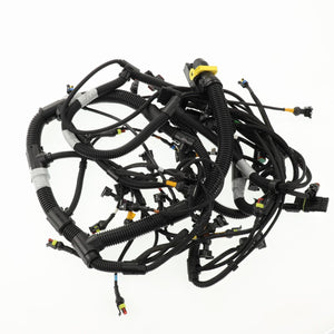 The AGCO Harness - Acw0169110, featuring numerous black cables, connectors, and distinctive yellow accents, is displayed against a stark white backdrop.