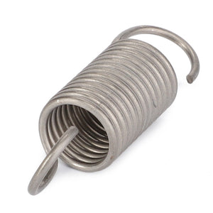 A close-up of the AGCO Pulling Spring - F281870062040, which is a cylindrical and densely coiled metal tension spring featuring loops on both ends.