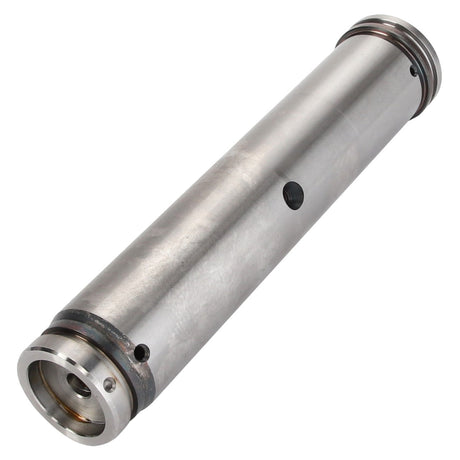 A close-up of the AGCO Pin - Acp0512240, a cylindrical metal mechanical part featuring holes and grooves, which is likely a crucial component for industrial machinery or automotive applications.