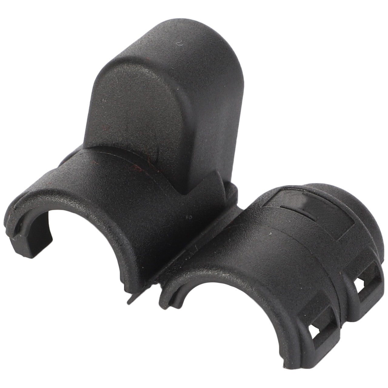 The AGCO Cover, Electrical Connector - D44900852 is a plastic two-piece ferrite core, displayed in a split, open state, and designed to reduce electromagnetic interference. Currently, there is no additional product description information available.