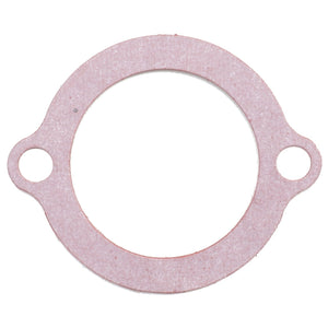 The AGCO Gasket - 3284112M2 is a round gasket with two small protruding tabs, each featuring a hole for mounting, designed specifically for Massey Ferguson models to prevent leakage effectively.