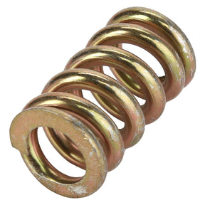 A close-up image of the AGCO Spring - Acp0397200. The spring, produced by AGCO, is made of thick gold-colored metal with visible wear from use.