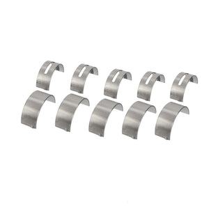 Nine metal semicircular bearing shells meticulously arranged in three orderly rows from the AGCO Kit, Bearing - Acp0318610.