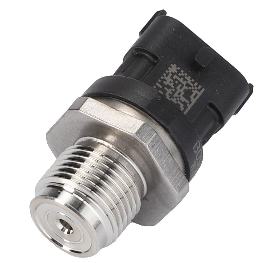 The AGCO Fuel Pressure Sensor - V837079833 is a metal automotive sensor with a threaded bottom and a black plastic connector at the top, featuring a QR code label. It's compatible with Massey Ferguson models.