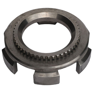 Close-up of the AGCO | Casing - 3617743M4, a round metal machinery part with gear teeth on the inner edge and four protruding tabs around the outer edge, commonly found in Massey Ferguson tractor models.