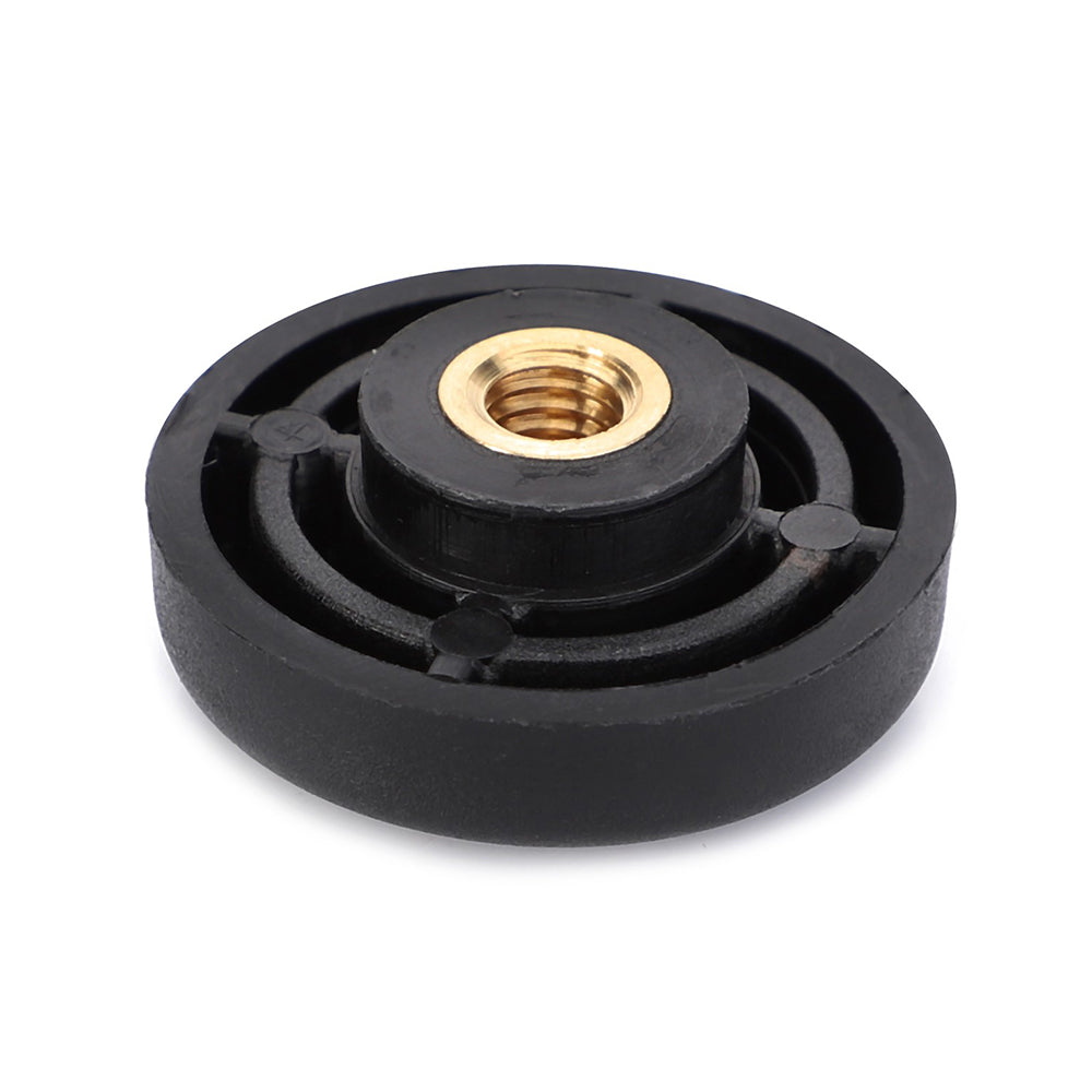 A black circular plastic knob with a central brass threaded insert, known as the Massey Ferguson - Button - 3805521M1 from AGCO, ideal for Massey Ferguson tractors.