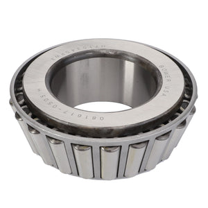 A single AGCO tapered roller bearing (CH2D-9455) with metal rollers enclosed in a ring. The inner cone is marked with text including "BOWER USA" and numeric codes.