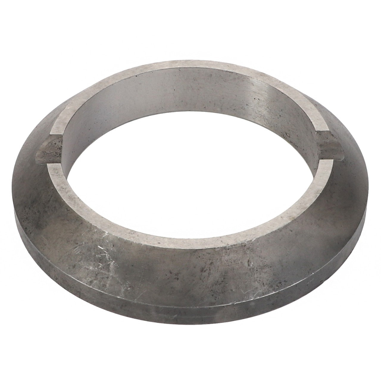 The AGCO SLEEVE BUSHING - V30385700 is a metallic, ring-shaped object with a flat surface and a circular opening.