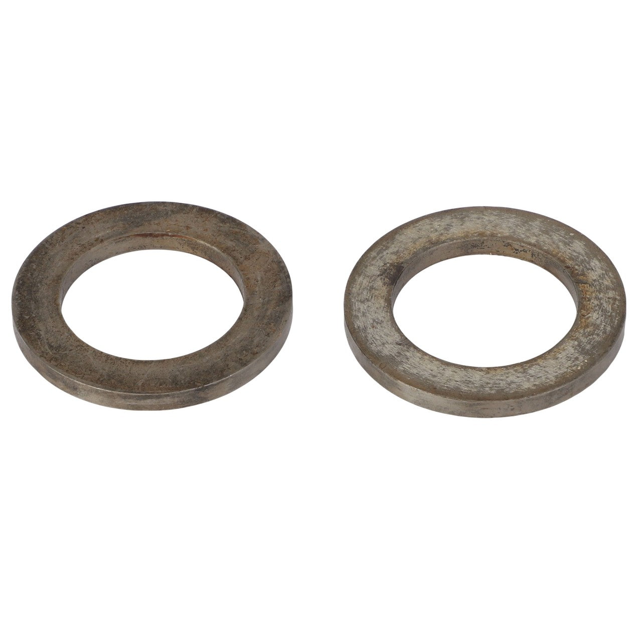 Two AGCO SPACER - AG708918 metal washers, each featuring a circular shape with a central hole, placed side by side on a white background. No current product description information is available.