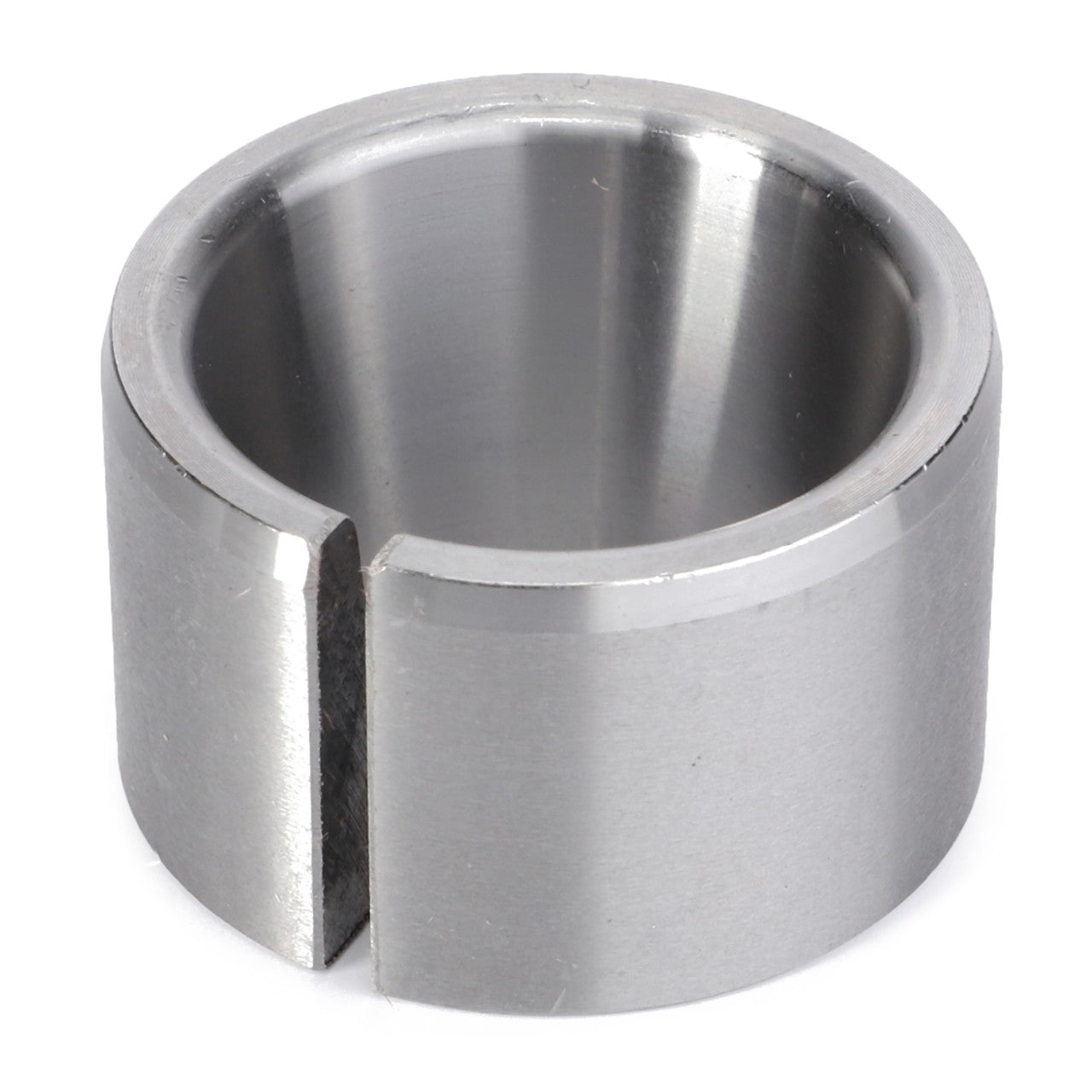 The AGCO Taper Bush - 1721-14-07-22 is a cylindrical metal ring featuring a single vertical slit on one side and boasts a shiny, smooth surface, making it ideal for Fendt models.